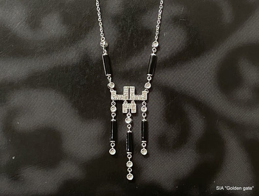 Ожерелье с бриллиантами и ониксом