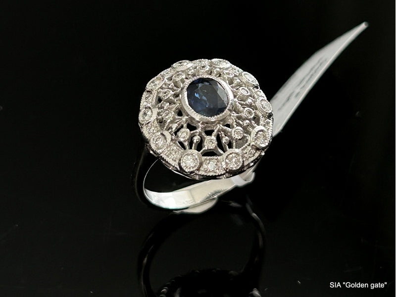 Кольцо с бриллиантами и сапфиром