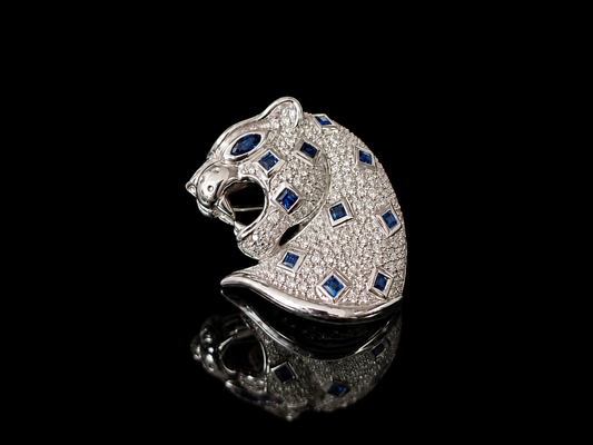 18kt white gold diamond and sapphire pendant/brooche