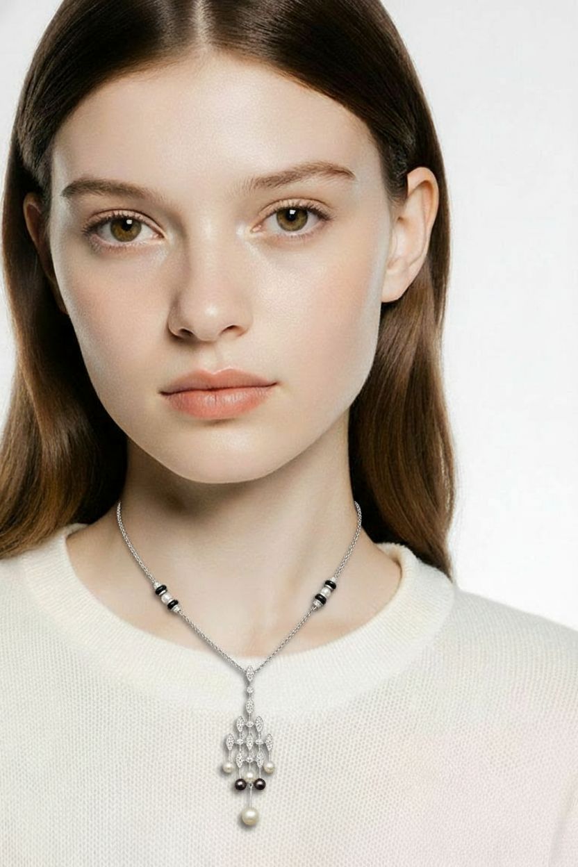 14kt white gold diamond, pearl and onyx necklace