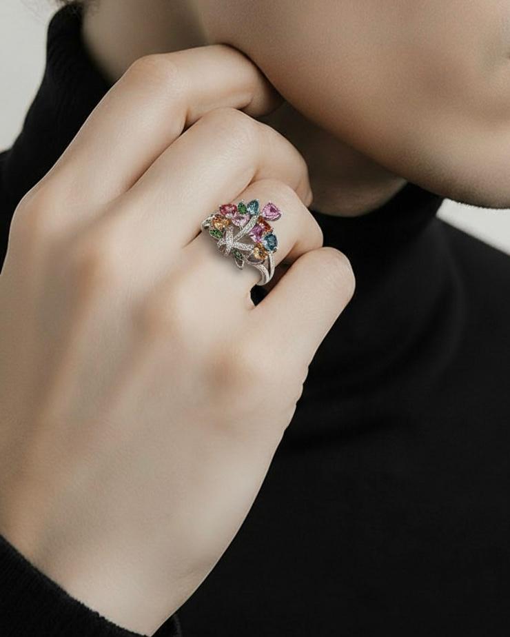 18kt white gold sapphire, tsavorite and diamond ring