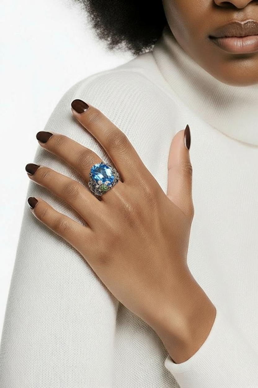 18kt white gold topaz, sapphire, garnet and diamond ring