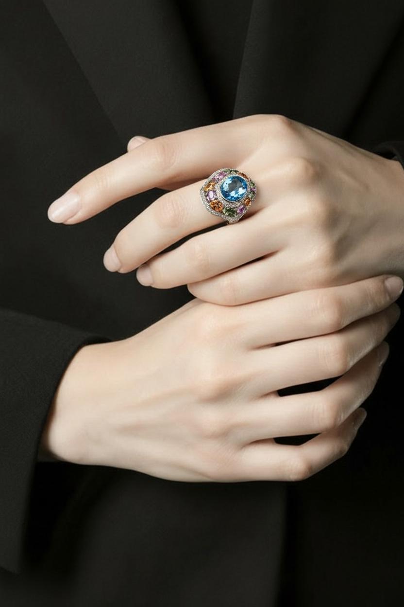 14kt white gold blue topaz, sapphire and diamond ring